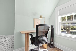 Elevate your workday experience with this expertly curated workspace that seamlessly blends modern refinement and natural inspiration.