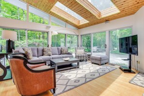 Living Room | Flat-Screen TV | Fireplace | Picture Windows | 1st Floor