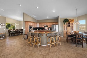 Large chef's kitchen with bar seating, dinette  and formal dining (not in pic).