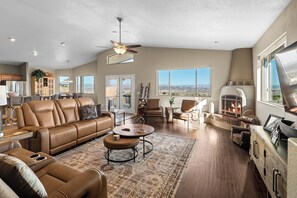 Open concept living room, kitchen and dining room on main floor