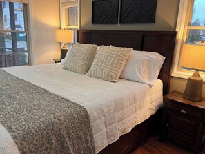 First floor king bed ensuite with fireplace and kitchenette