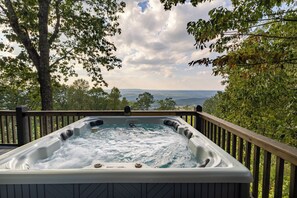 Soak in the hot tub on the back deck with views of the mountain and valleys. 