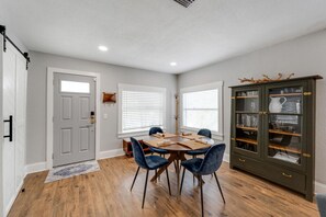 Bright and inviting dining space featuring a modern table