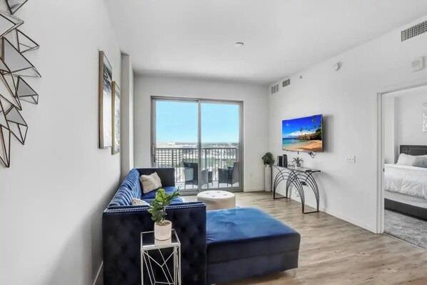 Spacious Living Room with TV