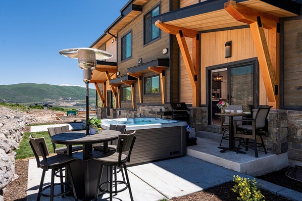 New hot tub, patio furnishings, heater and BBQ