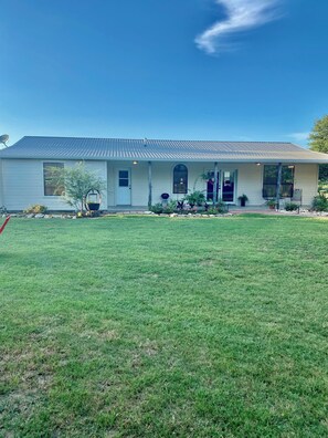 Back porch and spacious yard
