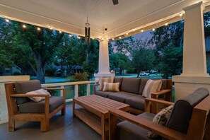 Cozy front porch with comfortable seating and a perfect spot for enjoying your morning coffee.
