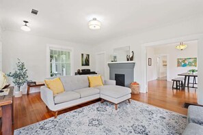 Spacious living area with comfortable couches, perfect for gathering with friends and family.