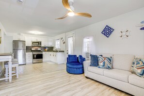 Living Room | Queen Sleeper Sofa | Window Air Conditioning Unit