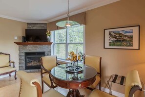  Natural light fills this charming dining space with thoughtful decor touches