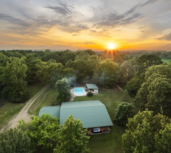 Aerial view of our 10 Acres of Land with a main house and 6 airstreams for your group to enjoy!