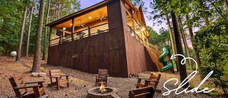 Gather around the fire pit in the evening, where the surrounding trees create a serene backdrop for your conversations.