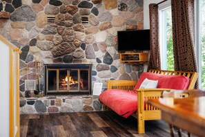 Our stone fireplace is surely a focal point of our main floor. She is a beaut, wouldn't you agree?