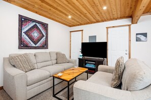 The rec room with ultra comfy couches and a smart TV for all of your streaming needs.