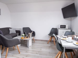 Furniture, Interior Design, Flooring, Floor, Room, Home, Apartment, Chair, Living Room, Comfort