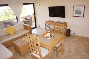 Dining Area with Large Flat Screen TV