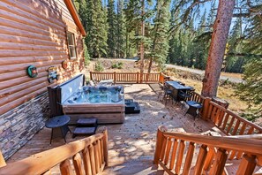 Exterior: Deck, fire table, hot tub, gas grill, beautiful mountain views