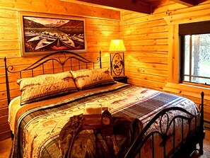 Spacious Master bedroom with king sized bed and television equipped with Roku.