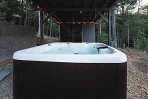 Hot tub with relaxing jets and outdoor lighting