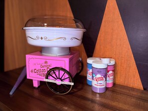 A retro-style cotton candy machine (with flavours like cherry, grape, etc.)
