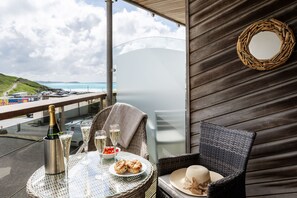 3 Waves, Watergate Bay: South-facing balcony with sea views to the right
