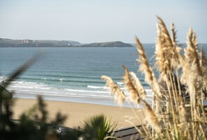 The rolling waves and golden sand of Watergate Bay awaits