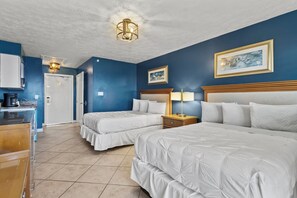 Amenities include a smart TV with cable, a mini fridge, a microwave, and a coffee maker.