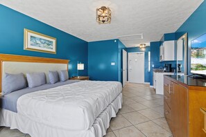 Amenities include a smart TV with cable, a mini fridge, a microwave, and a coffee maker.