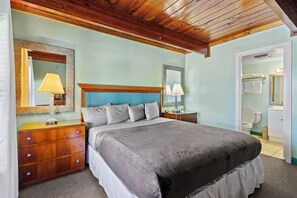 Comfortable rustic charm with wood ceilings and coastal colors and decor.