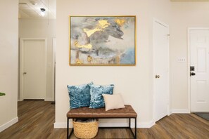 Living room with extra pillows and blankets