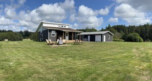 Back entrance with barbecue on site
