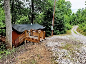 Parking for two cars along the road behind the cabin