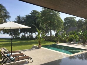 Chaise longues by the pool
