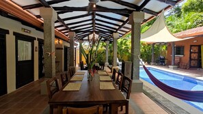 Poolside dining area mid-day.