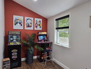 The game room with arcade games offers entertainment for all ages