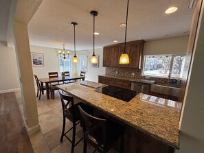 Kitchen island and dining area.