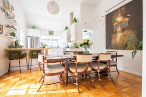 Open concept kitchen and dining.