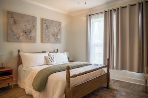 Master Bedroom with Smart TV and attached full bathroom