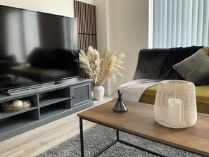 Living area with 65" Smart 4K TV