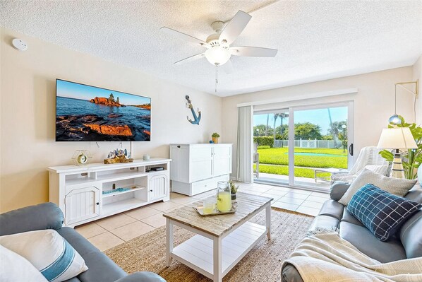 Comfortable living room with natural light and cozy seating for relaxation
