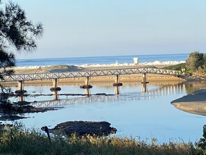 Its a 2 minute flat walk to the river and beach
