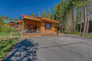 Exterior: View of front of home, driveway, front deck