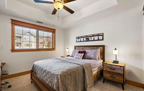 Second Bedroom with Cozy Queen-Size Bed and Ample Closet Space