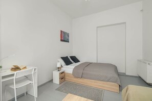 Bedroom with a coffee table.