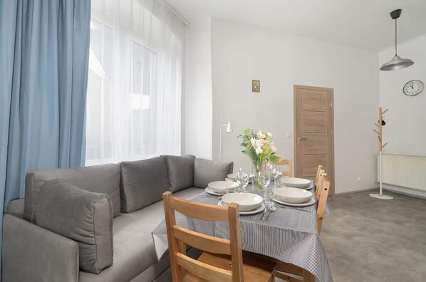 Living room with kitchenette.