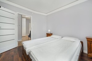 Bedroom with large double bed.