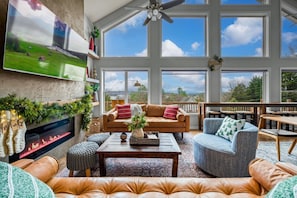 Perfect for holiday gatherings or a quiet retreat, this stylish space invites you to curl up with a good book by the fire, sip hot cocoa, or simply soak in the beautiful surroundings.