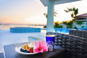 Breakfast at sunrise overlooking the water is a tranquil way to start your day at Birds.