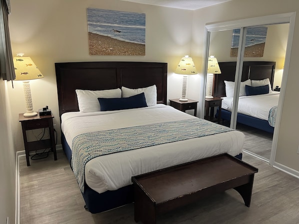 Elegant, serene bedroom showcasing a comfortable king-size bed