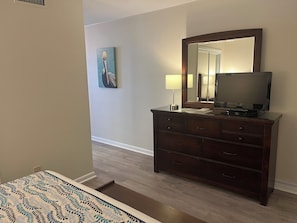 well-equipped bedroom with a TV for easy entertainment